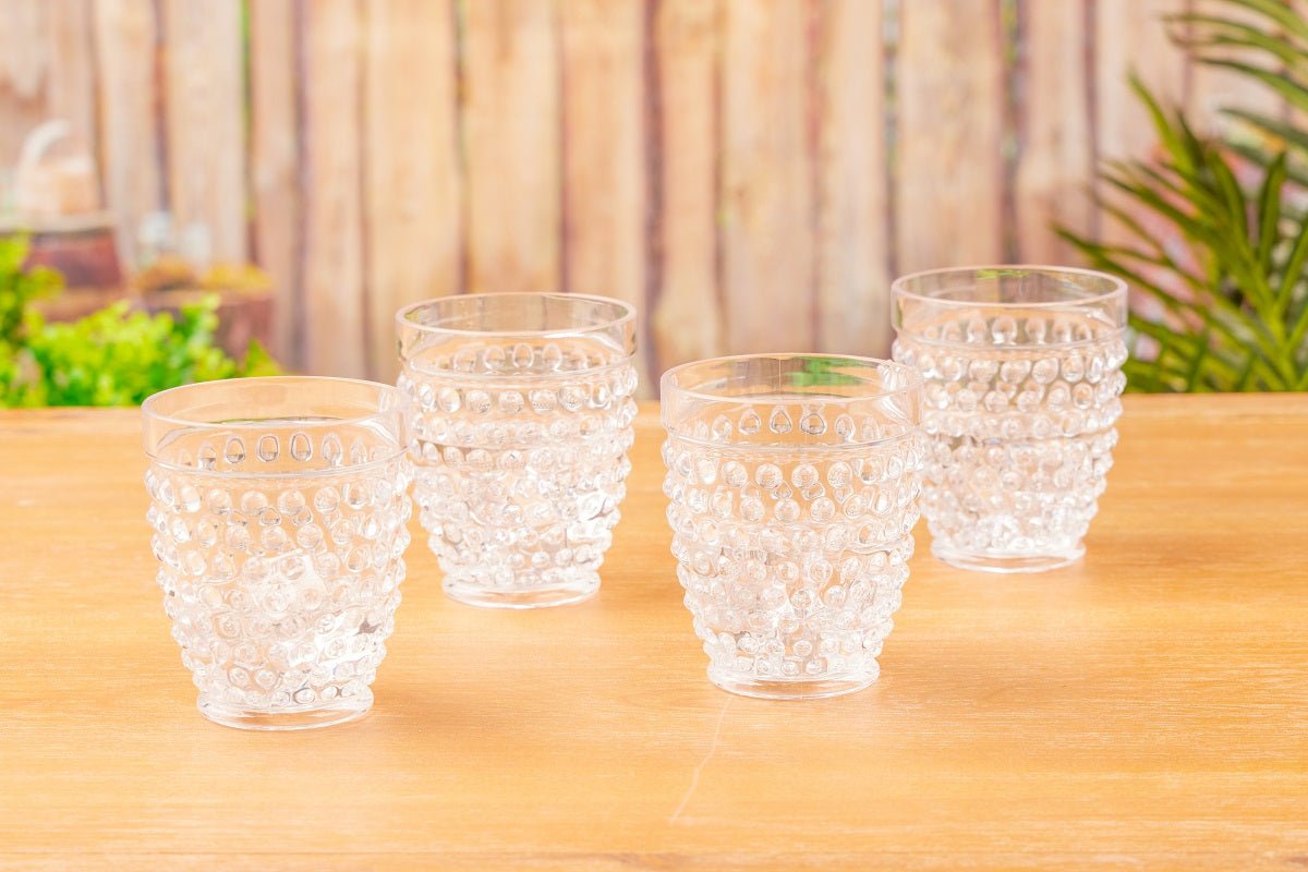 http://dressbarn.com/cdn/shop/files/pier-1-emma-clear-acrylic-13-oz-drinking-glasses-set-of-4-538929.jpg?v=1699551788