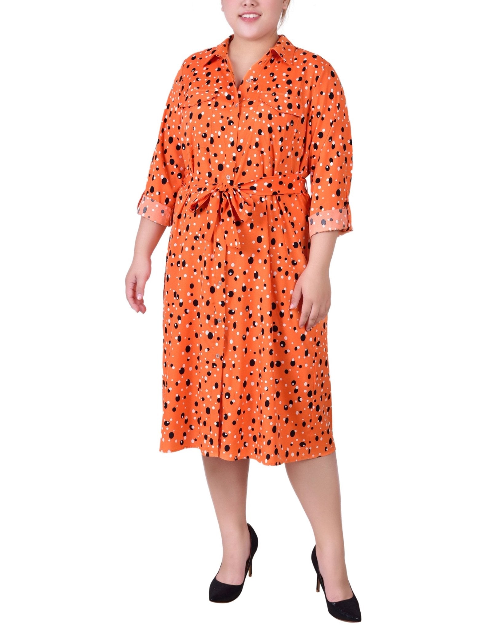 rust shirt dress A statement in motion. The rust-colored maxi shirt dress flows with every step, defined by its A-line silhouette and adjustable tie belt. Utility-inspired chest pockets meet a soft, feminine shape, creating a