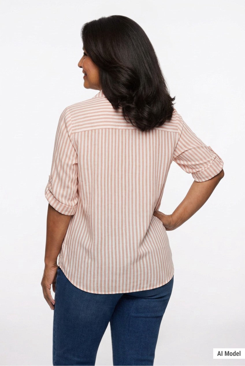 Back view of a woman in a pink and white vertical stripe roll-tab 3/4 sleeve button-front blouse paired with dark blue jeans.