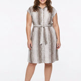 Plus-size model wears a knee-length sleeveless snake-print shirtdress in taupe and ivory with a self-tie belt, front full