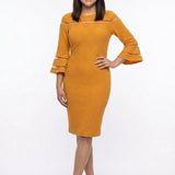 Mustard textured sheath midi dress with sheer contrast stripe detail at chest and flared bell sleeves, worn by a dark-haired