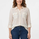 Woman wearing an ivory windowpane button-front blouse with roll-tab 3/4 sleeves and dual chest pockets, front view, waist up.