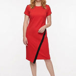Red short-sleeve sheath dress with black diagonal asymmetric hem trim and shoulder buttons, worn by a woman, front view.