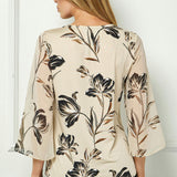 3/4 Flare Sleeve Cutout Trim Front Neck Swing Blouse in Beige