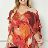 Cold Shoulder V-Neck Hanky Hem Poncho Top in Ivory/Marigold/Orange