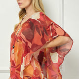 Cold Shoulder V-Neck Hanky Hem Poncho Top in Ivory/Marigold/Orange