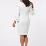 White textured sheath dress with bell sleeves and sheer stripe details, back view, worn by a dark-haired woman with nude