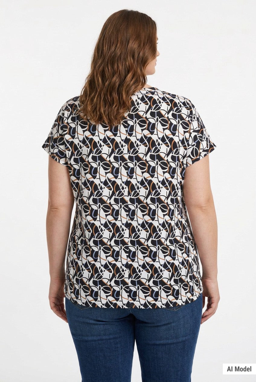 Plus-size woman shown from back wearing a short-sleeve pullover top with navy, white, and taupe abstract print, paired with