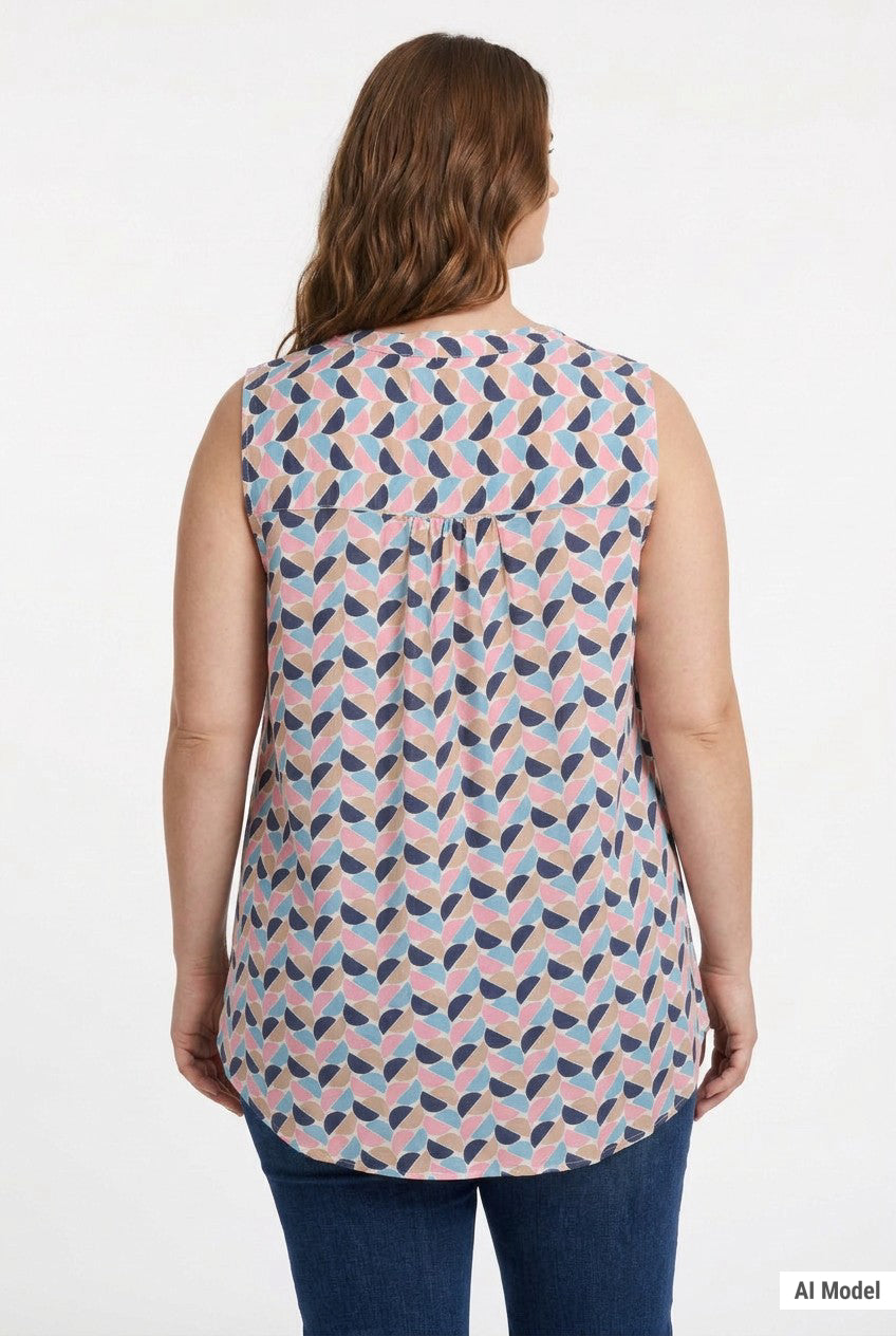 Plus-size model wearing a sleeveless blouse with geometric half-moon print in navy, pink, blue, and tan, with back pintuck