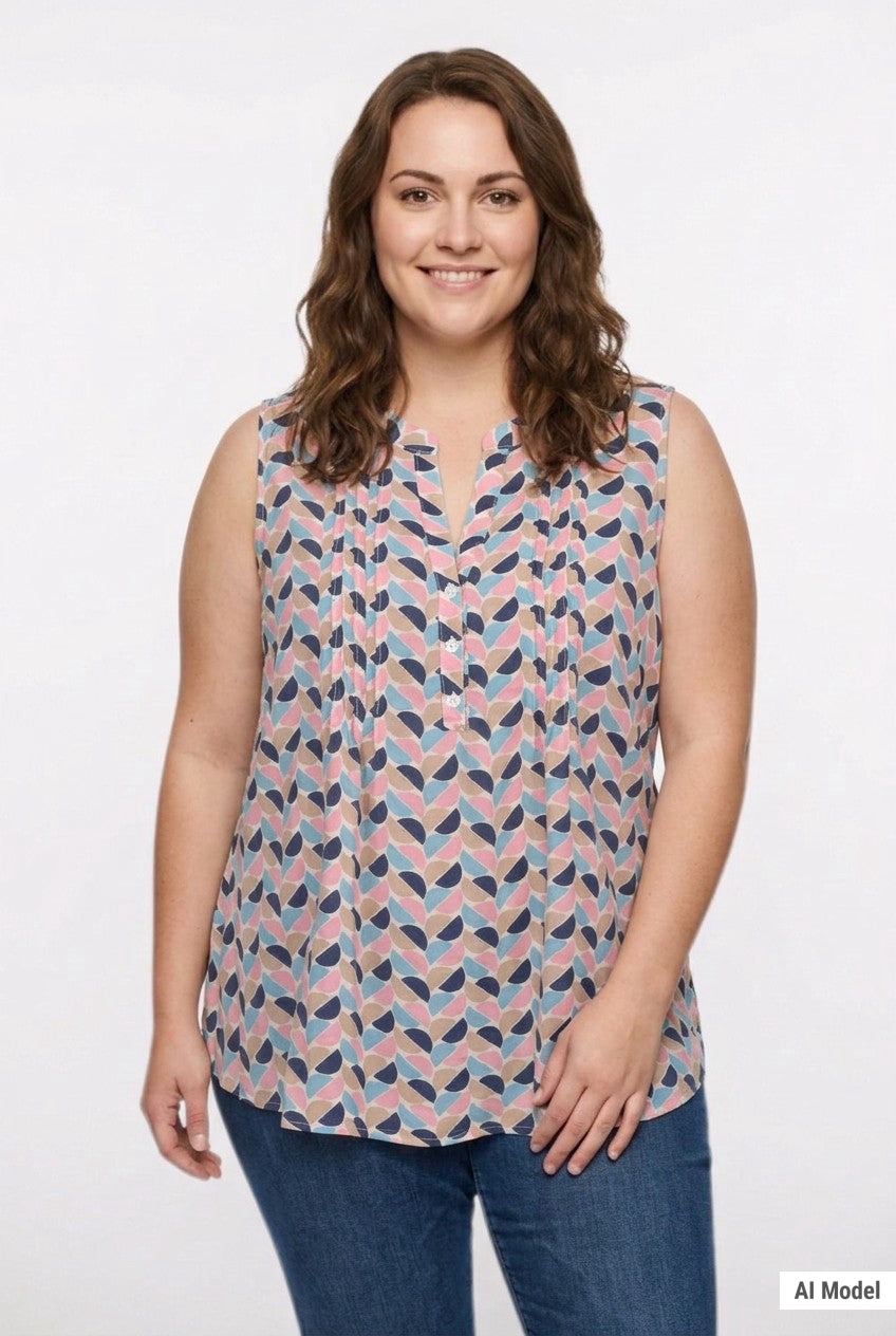 Plus-size model wears a sleeveless pintucked blouse in a multicolor half-moon geometric print with a split neckline and