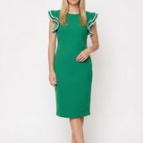 Blonde female model wearing an emerald green scuba crepe sheath dress with ruffle sleeves and white contrast tipping; midi
